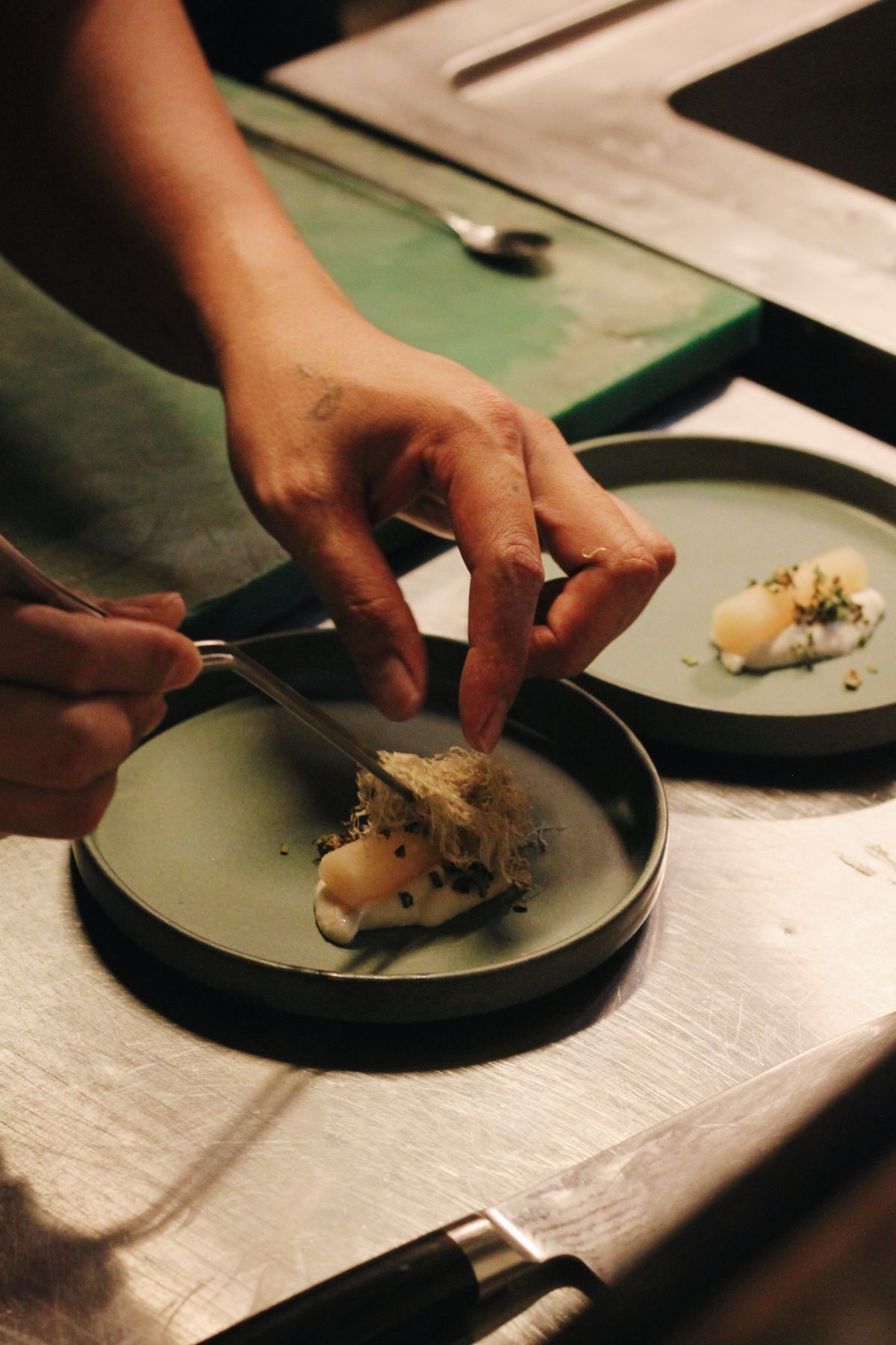 Chef plating a dish
